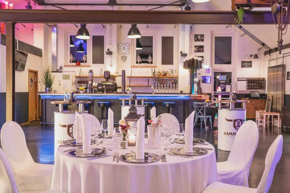 Event Venue 9 – Historic event venue: stone facade at night, ballroom, bar and lightin