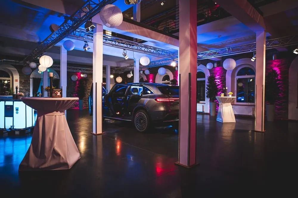 Event Venue 10 – Historic event venue: stone facade at night, ballroom, bar and lightin